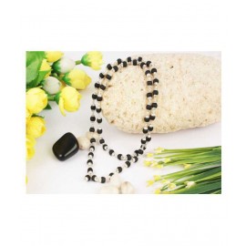 Black Tulsi Beads Mala In Brass made silver Self Design Caps Black Tulsi Beads Mala In Brass made silver Self Design Caps