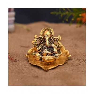 HOMETALES Leaf Ganesha with deepak Decorative Showpiece - 7 cm  (Aluminium, Gold)
