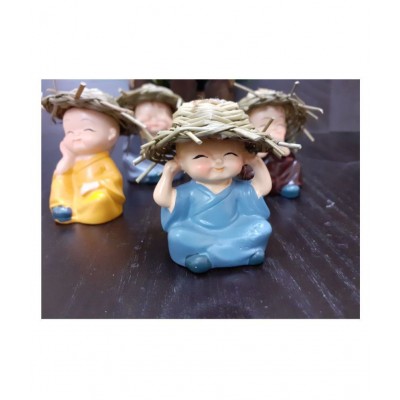 Spreading Smiles Multicolour Polyresin Figurines - Pack of 4